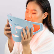 LED light therapy mask 3 lights shining on face